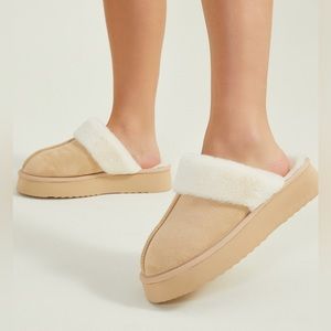 Cozy platform slippers. Very soft. Brand new with tags.
